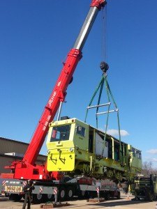 crane spreader bars lifting amtrak car